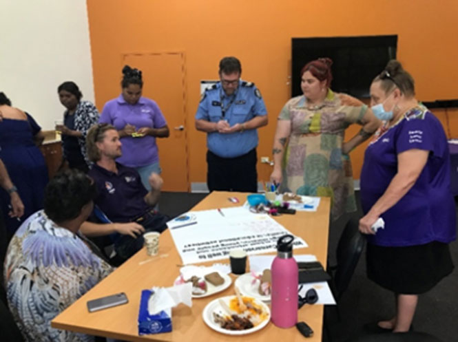 CEEP Team and local stakeholders discussing at a table in the Annual Community Forum.