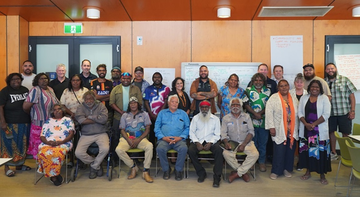 A group photo of people at the Ngaanyatjarra Pitjantjatjara Yankunytjatjara Governance Forum.