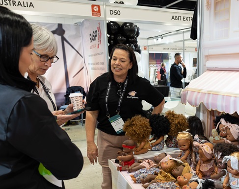 Stall holders speaking with attendees at the Supply Nation's Connect Forum in Sydney, New South Wales.