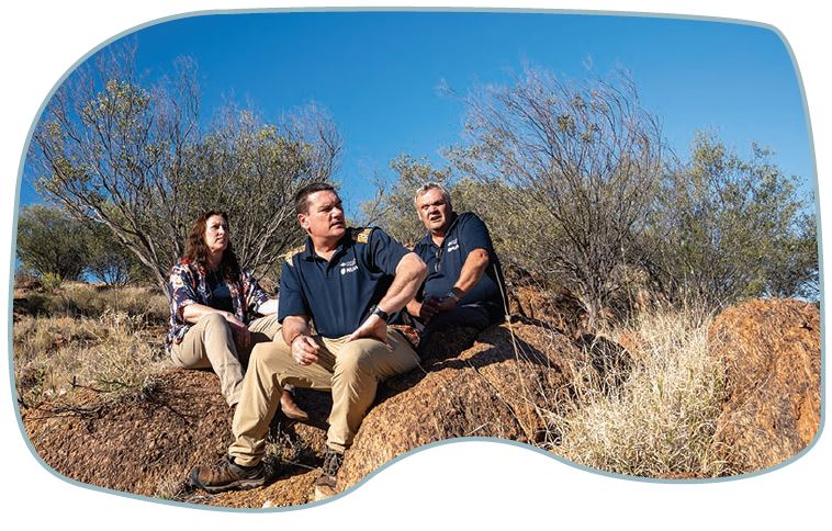 NIAA Central team of 3 people at the Olive Pink Botanic Garden in Alice Springs