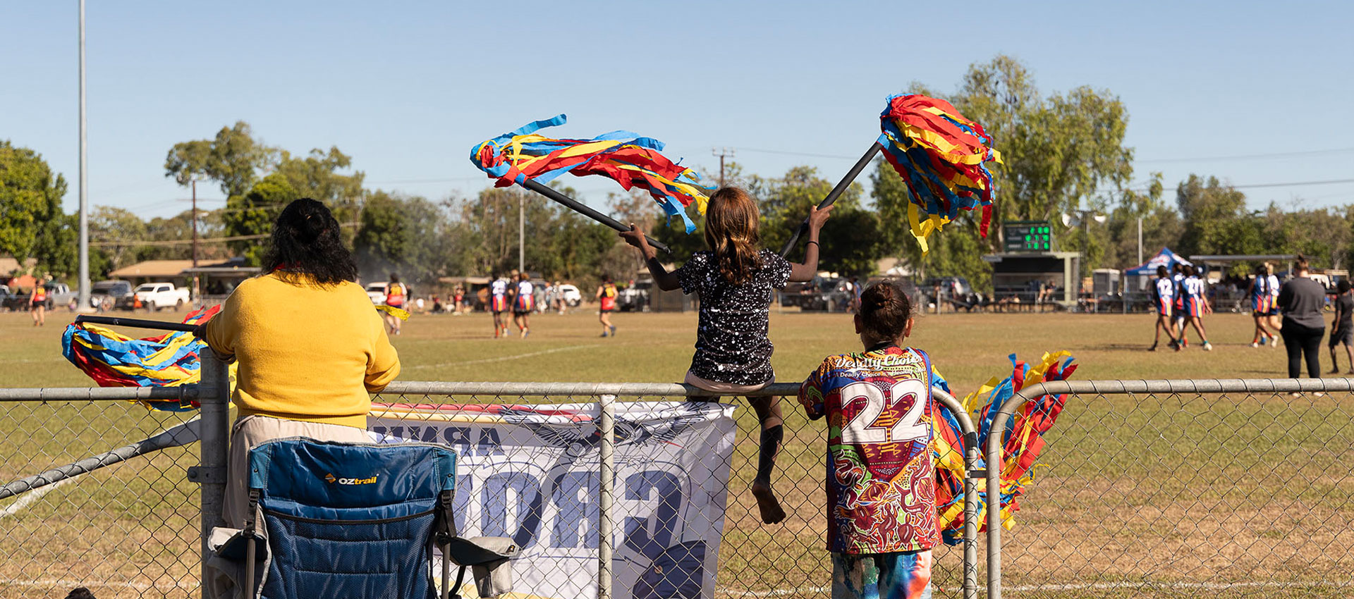 Cheering on the teams at the AFL Grand Final, Barunga, NT