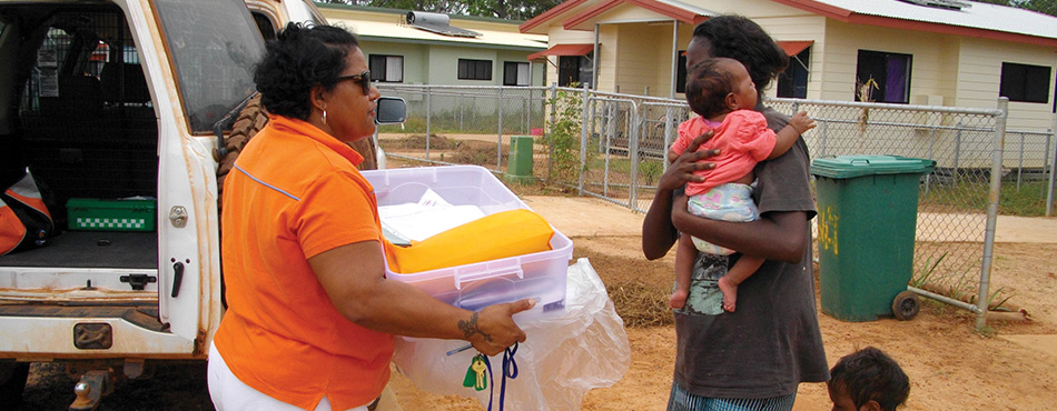 Baby One health worker Johanna Hunt visiting a family in Aurukun.