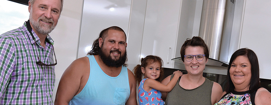 Happy clients are pictured here after securing a home loan from Indigenous Business Australia.