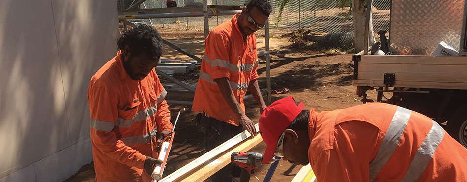 Pictured here are Jilkminggan community members building the community’s new Outback Store.