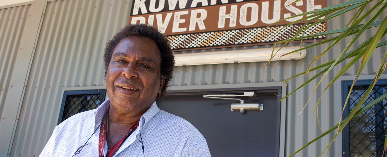 In this photo the Kowanyama River House owner and founder, Thomas Hudson, is shown in front of his business. He is expanding his Indigenous tourism business on the Cape York Peninsula of Far North Queensland and expects that this will create additional local employment.