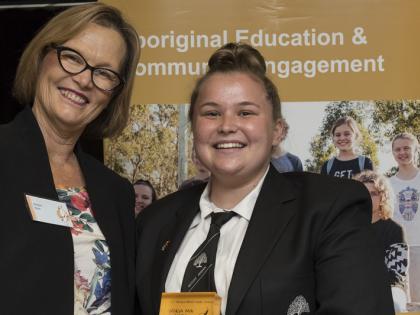 In this photo High School student Emily Backhouse is pictured after winning her second Nanga Mai Award for Outstanding Leadership. The NSW Department of Education’s Robyn Bale is also in the photo. 
