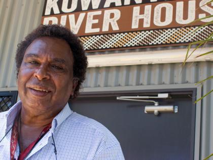 In this photo the Kowanyama River House owner and founder, Thomas Hudson, is shown in front of his business. He is expanding his Indigenous tourism business on the Cape York Peninsula of Far North Queensland and expects that this will create additional local employment. 