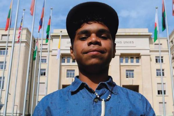 Dujuan Hoosan at the United Nations building in Geneva, Switzerland (Photo courtesy of Maya Newell)