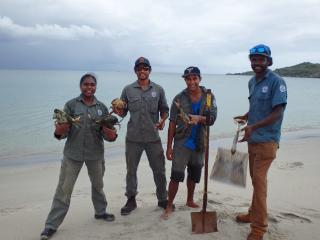 Dhimurru Rangers with mud crabs. Photo © Dhimurru Aboriginal Corporation