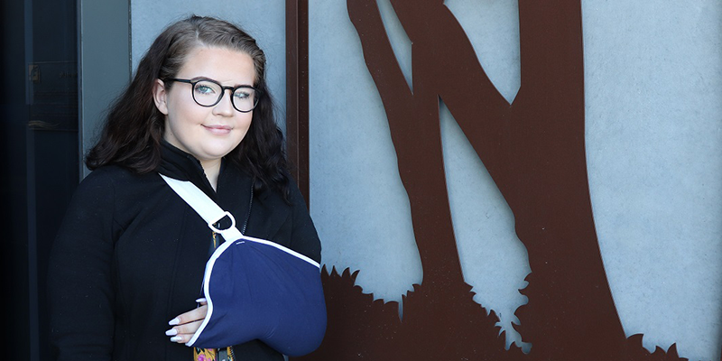 Image of Chloe Backhouse, arm in a sling