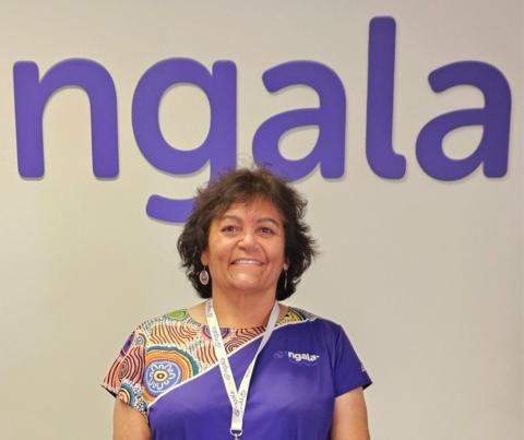 Nanna Kay Mongoo smiling for the camera in front of the Ngala logo